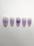 This BTS-inspired handmade press-on nail set features purple and white gradient tones with elegant detailing, inspired by BTS’s signature purple. Designed to represent love, trust, and the lasting bond between artist and fans, these nails are perfect for ARMYs who want a subtle yet meaningful look.